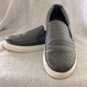 Black slide on tennis shoes